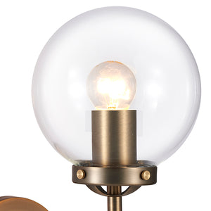 Everly Antique Brass Wall Sconce Light with Clear Globe Shade